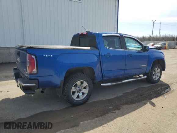 2018 GMC Canyon 4WD SLE z VIN 1GTG6CEN0J1262745, wystawiony jako Copart lot #54671585 z przebiegiem Nie podano mil oraz Szkoda całkowita • Salvage title. Historia ofert i sprzedaży dostępna na DreamBid. Obrazek 3.