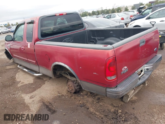 2002 Ford F-150 XL with VIN 1FTRX17W72NB88475, listed as a IAAI auction lot 41574244 with 200,396 mi miles. Bid and sale history available at carsss.com. Image 3.