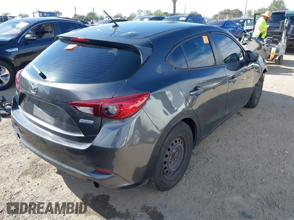 2017 Mazda 3 Sport with VIN 3MZBN1K76HM101415, listed as a IAAI auction lot 42012311 with 222,246 mi miles. Bid and sale history available at carsss.com. Image 4.