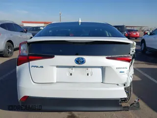 2021 Toyota Prius L Eco with VIN JTDKAMFU7M3133544, listed as a IAAI auction lot 41548653 with 115,214 mi miles and . Bid and sale history available at DreamBid. Image 17.