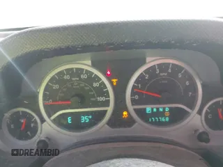 2009 Jeep Wrangler Unlimited Rubicon z VIN 1J4GA69159L749215, wystawiony jako IAAI lot #41489893 z przebiegiem 177 768 mil mil oraz . Historia ofert i sprzedaży dostępna na DreamBid. Obrazek 7.