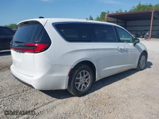 2023 Chrysler Pacifica Touring L with VIN 2C4RC1BG0PR616151, listed as a IAAI auction lot 42044983 with 40,152 mi miles. Bid and sale history available at carsss.com. Image 4.