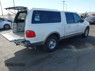 2003 Ford F-150 XLT with VIN 1FTRW07L23KA82084, listed as a IAAI auction lot 42140764 with 286,754 mi miles. Bid and sale history available at carsss.com. Image 4.