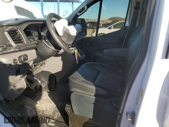 2023 Ford Transit Cargo with VIN 1FTBR1Y8XPKA34637, listed as a Copart auction lot 88069655 with 58,506 mi miles and Salvage Title. Bid and sale history available at DreamBid. Image 7.