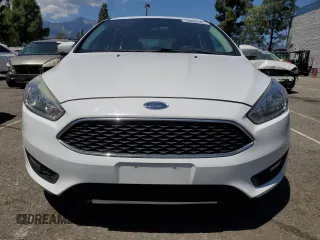 2016 Ford Focus SE with VIN 1FADP3K24GL225565, listed as a Copart auction lot 54949705 with 124,532 mi miles and Salvage Title. Bid and sale history available at carsss.com. Image 5.