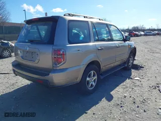 2007 Honda Pilot LX with VIN 5FNYF28127B038187, listed as a IAAI auction lot 41639252 with 149,548 mi miles. Bid and sale history available at carsss.com. Image 4.