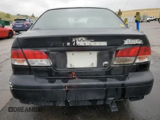 1999 Infiniti G20 z VIN JNKCP11A8XT019442, wystawiony jako Copart lot #66429804 z przebiegiem 209 367 mil mil oraz Szkody całkowita. Historia ofert i sprzedaży dostępna na DreamBid. Obrazek 6.