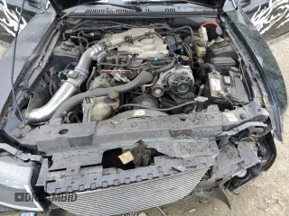 1999 Ford Mustang with VIN 1FAFP4040XF146055, listed as a Copart auction lot 55977035 with Not provided miles and Salvage title. Bid and sale history available at DreamBid. Image 11.