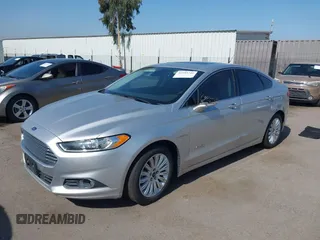 2016 Ford Fusion SE Hybrid z VIN 3FA6P0LU8GR203934, wystawiony jako IAAI lot #42595741 z przebiegiem 84 189 mil mil oraz . Historia ofert i sprzedaży dostępna na DreamBid. Obrazek 18.