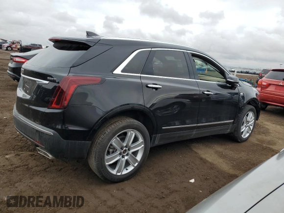 2021 Cadillac XT5 AWD Luxury z VIN 1GYKNBR4XMZ112957, wystawiony jako Copart lot #45513165 z przebiegiem 45 322 mil mil oraz Czysty tytuł • Clean title. Historia ofert i sprzedaży dostępna na DreamBid. Obrazek 3.