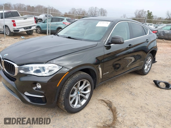 2015 BMW X6 xDrive35i z VIN 5UXKU2C56F0N76862, wystawiony jako IAAI lot #41747776 z przebiegiem 119 426 mil mil oraz . Historia ofert i sprzedaży dostępna na DreamBid. Obrazek 18.