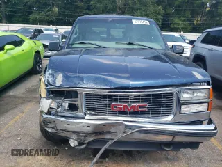 1999 GMC Suburban z VIN 3GKFK16R2XG544767, wystawiony jako Copart lot #67078414 z przebiegiem 154 145 mil mil oraz Szkoda całkowita • Salvage title. Historia ofert i sprzedaży dostępna na DreamBid. Obrazek 5.