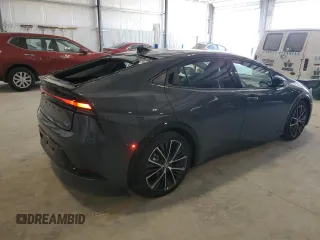 2023 Toyota Prius LE z VIN JTDADABU5P3002057, wystawiony jako Copart lot #47227675 z przebiegiem Nie podano mil oraz Szkoda całkowita • Salvage title. Historia ofert i sprzedaży dostępna na DreamBid. Obrazek 3.