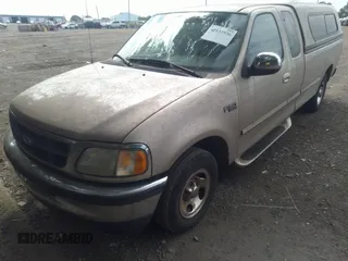1997 Ford F-150 with VIN 1FTDX17W6VKB77743, listed as a IAAI auction lot 42633936 with 111,152 mi miles and . Bid and sale history available at DreamBid. Image 2.