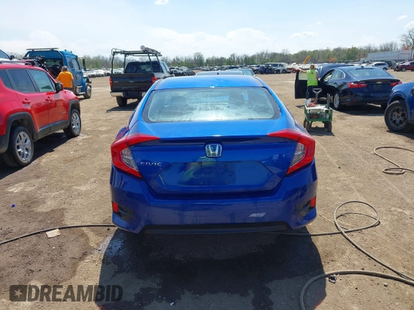 2018 Honda Civic LX with VIN 19XFC2F53JE020297, listed as a IAAI auction lot 42114807 with 124,058 mi miles and . Bid and sale history available at carsss.com. Image 16.