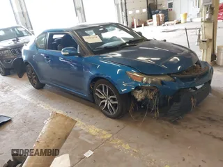 2014 Scion tC z VIN JTKJF5C70E3072436, wystawiony jako IAAI lot #42001918 z przebiegiem 203 164 mil mil oraz . Historia ofert i sprzedaży dostępna na DreamBid. Obrazek 1.