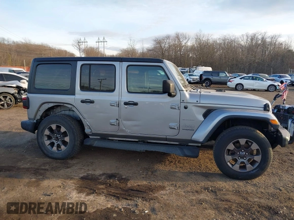 2018 Jeep Wrangler Unlimited Sahara z VIN 1C4HJXEN4JW173435, wystawiony jako IAAI lot #41453040 z przebiegiem 51 530 mil mil oraz . Historia ofert i sprzedaży dostępna na DreamBid. Obrazek 13.