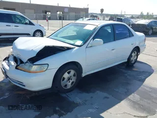 2001 Honda Accord EX z VIN 1HGCG16501A074615, wystawiony jako IAAI lot #42297708 z przebiegiem 187 936 mil mil oraz . Historia ofert i sprzedaży dostępna na DreamBid. Obrazek 17.