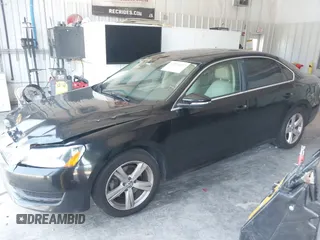 2012 Volkswagen Passat SE with VIN 1VWBP7A31CC049830, listed as a IAAI auction lot 42578197 with 239,426 mi miles and . Bid and sale history available at DreamBid. Image 2.