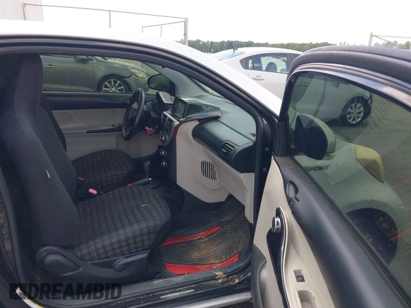 2013 Scion iQ with VIN JTNJJXB00DJ023345, listed as a IAAI auction lot 42631440 with 73,105 mi miles and . Bid and sale history available at DreamBid. Image 5.