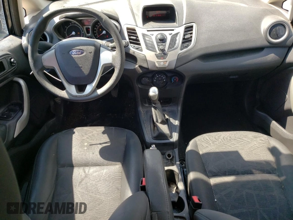 2012 Ford Fiesta SE z VIN 3FADP4BJ5CM195837, wystawiony jako Copart lot #57363165 z przebiegiem 108 003 mil mil oraz Szkoda całkowita • Salvage title. Historia ofert i sprzedaży dostępna na DreamBid. Obrazek 8.