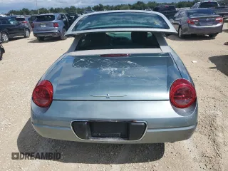 2004 Ford Thunderbird Pacific Coast Roadster with VIN 1FAHP63A04Y108766, listed as a Copart auction lot 74766964 with 30,107 mi miles and Salvage Title. Bid and sale history available at DreamBid. Image 6.
