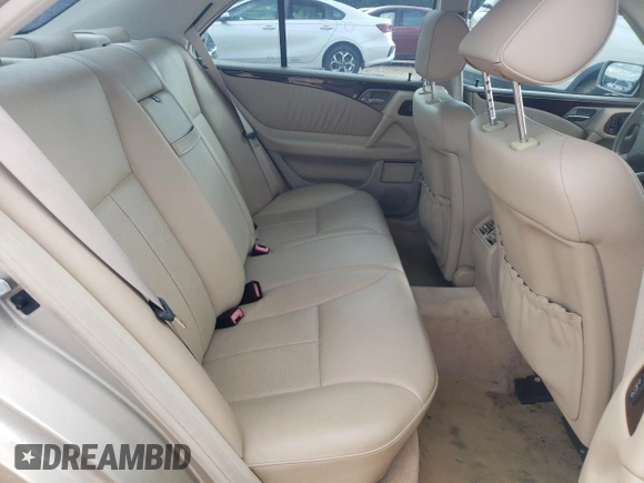 1999 Mercedes-Benz E-Class with VIN WDBJF65HXXA891437, listed as a Copart auction lot 73278334 with 197,159 mi miles and Salvage Title. Bid and sale history available at carsss.com. Image 10.