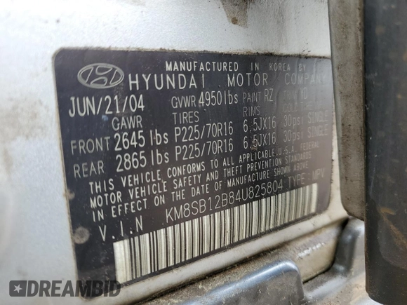 2004 Hyundai Santa Fe z VIN KM8SB12B84U825804, wystawiony jako Copart lot #51107585 z przebiegiem 229 942 mil mil oraz Szkoda całkowita • Salvage title. Historia ofert i sprzedaży dostępna na DreamBid. Obrazek 13.