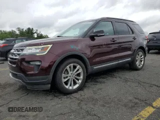 2018 Ford Explorer XLT with VIN 1FM5K8D82JGA29955, listed as a Copart auction lot 62458515 with 106,028 mi miles and Salvage title. Bid and sale history available at DreamBid. Image 1.