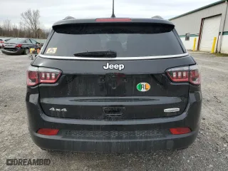 2019 Jeep Compass Latitude with VIN 3C4NJDBB8KT599275, listed as a Copart auction lot 52447025 with 104,576 mi miles and Salvage Title. Bid and sale history available at carsss.com. Image 6.