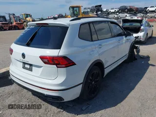 2022 Volkswagen Tiguan SE R-Line Black with VIN 3VVCB7AX5NM009696, listed as a IAAI auction lot 42364884 with 45,380 mi miles and . Bid and sale history available at DreamBid. Image 4.