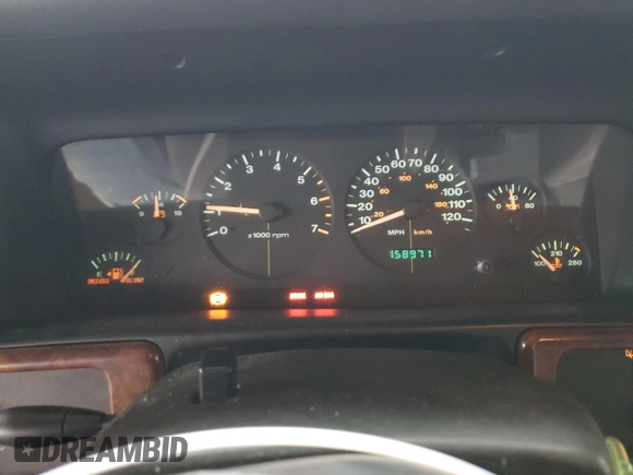 1997 Jeep Grand Cherokee TSi with VIN 1J4FX58S6VC602782, listed as a Copart auction lot 86605074 with 158,971 mi miles and Salvage Title. Bid and sale history available at carsss.com. Image 9.