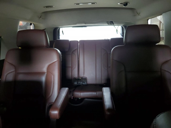 2015 Chevrolet Tahoe LTZ z VIN 1GNSKCKC4FR277564, wystawiony jako Copart lot #60589335 z przebiegiem Nie podano mil oraz Szkoda całkowita • Salvage title. Historia ofert i sprzedaży dostępna na DreamBid. Obrazek 10.