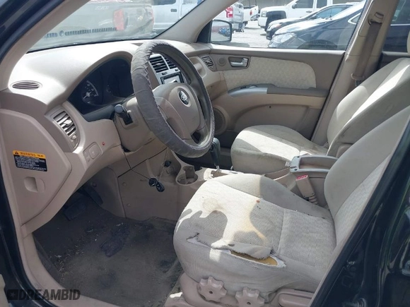 2006 Kia Sportage LX with VIN KNDJF723367279463, listed as a IAAI auction lot 41787584 with 171,271 mi miles. Bid and sale history available at carsss.com. Image 5.