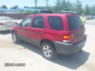 2006 Ford Escape XLT with VIN 1FMCU03156KC06607, listed as a IAAI auction lot 42564636 with 183,896 mi miles and . Bid and sale history available at DreamBid. Image 3.