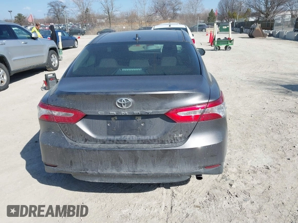 2019 Toyota Camry LE with VIN 4T1B11HK9KU810347, listed as a IAAI auction lot 41804007 with 75,063 mi miles and . Bid and sale history available at DreamBid. Image 17.