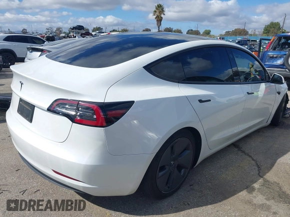 2023 Tesla Model 3 z VIN 5YJ3E1EA6PF488405, wystawiony jako IAAI lot #41570896 z przebiegiem 26 631 mil mil oraz . Historia ofert i sprzedaży dostępna na DreamBid. Obrazek 4.