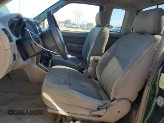 2002 Nissan Frontier XE with VIN 1N6DD26S92C381436, listed as a Copart auction lot 46527595 with 224,696 mi miles and Salvage title. Bid and sale history available at DreamBid. Image 7.