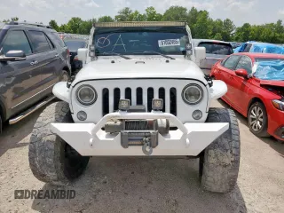 2015 Jeep Wrangler Unlimited Sport with VIN 1C4BJWDG9FL759012, listed as a Copart auction lot 61002465 with 101,395 mi miles and Salvage title. Bid and sale history available at DreamBid. Image 5.