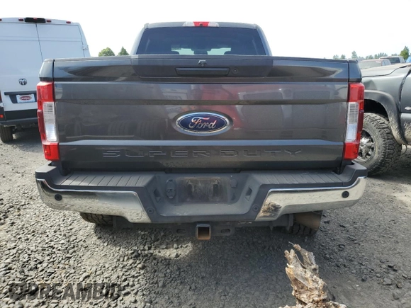 2019 Ford F-250 XL with VIN 1FT7W2BT9KEC24552, listed as a Copart auction lot 60644435 with 115,689 mi miles and Salvage title. Bid and sale history available at DreamBid. Image 6.