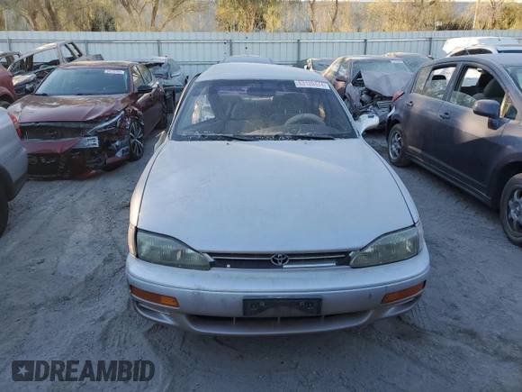 1995 Toyota Camry LE with VIN 4T1GK12E5SU76389, listed as a Copart auction lot 83120474 with 245,875 mi miles and Non Repairable. Bid and sale history available at carsss.com. Image 5.