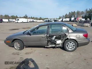 2000 Saturn SL z VIN 1G8ZK5275YZ244530, wystawiony jako IAAI lot #41784896 z przebiegiem 50 332 mil mil oraz . Historia ofert i sprzedaży dostępna na DreamBid. Obrazek 6.