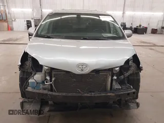 2015 Toyota Sienna SE with VIN 5TDXK3DC9FS527667, listed as a IAAI auction lot 41977729 with 230,933 mi miles and . Bid and sale history available at DreamBid. Image 13.