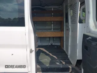 2015 Ford Transit Cargo z VIN 1FTNR1ZM5FKA65799, wystawiony jako IAAI lot #42473586 z przebiegiem 99 756 mil mil oraz . Historia ofert i sprzedaży dostępna na DreamBid. Obrazek 8.