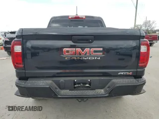 2024 GMC Canyon 4WD AT4 with VIN 1GTP6DEK9R1170928, listed as a Copart auction lot 77978644 with 0 mi miles and Salvage Title. Bid and sale history available at carsss.com. Image 6.