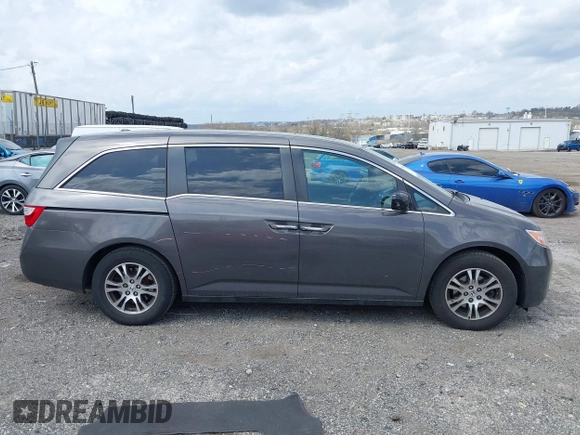2013 Honda Odyssey EX-L with VIN 5FNRL5H63DB034963, listed as a IAAI auction lot 41921431 with 163,609 mi miles and . Bid and sale history available at DreamBid. Image 13.