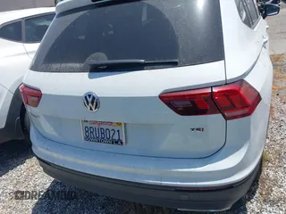 2018 Volkswagen Tiguan S with VIN 3VV1B7AX8JM032990, listed as a IAAI auction lot 42279807 with 74,185 mi miles and . Bid and sale history available at DreamBid. Image 17.