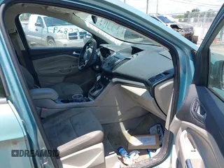 2013 Ford Escape SE z VIN 1FMCU0GX0DUA90717, wystawiony jako IAAI lot #42558297 z przebiegiem 122 785 mil mil oraz . Historia ofert i sprzedaży dostępna na DreamBid. Obrazek 5.