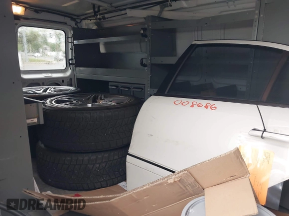 2007 Ford Econoline Cargo Commercial z VIN 1FTNE24L57DA71009, wystawiony jako IAAI lot #42333263 z przebiegiem 184 489 mil mil oraz . Historia ofert i sprzedaży dostępna na DreamBid. Obrazek 8.