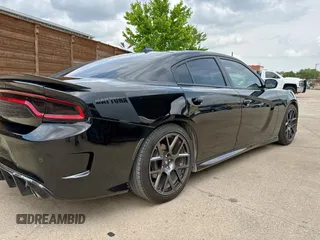 2019 Dodge Charger R/T with VIN 2C3CDXCT2KH650502, listed as a Copart auction lot 54974065 with 50,194 mi miles and Clean Title. Bid and sale history available at carsss.com. Image 4.